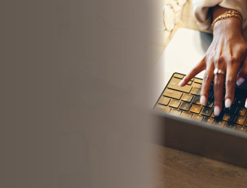 fingers typing keyboard