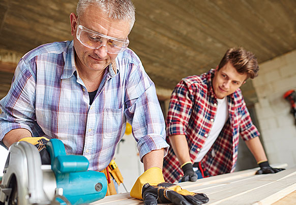 Two men working with supplies